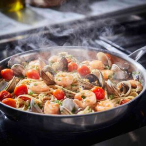 cooking linguine frutti di mare in pan